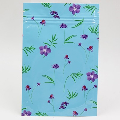 ซองซิปล็อคลายดอกไม้สีม่วงพื้นหลังสีฟ้า 100 ชิ้น ขนาด 8x12 cm.