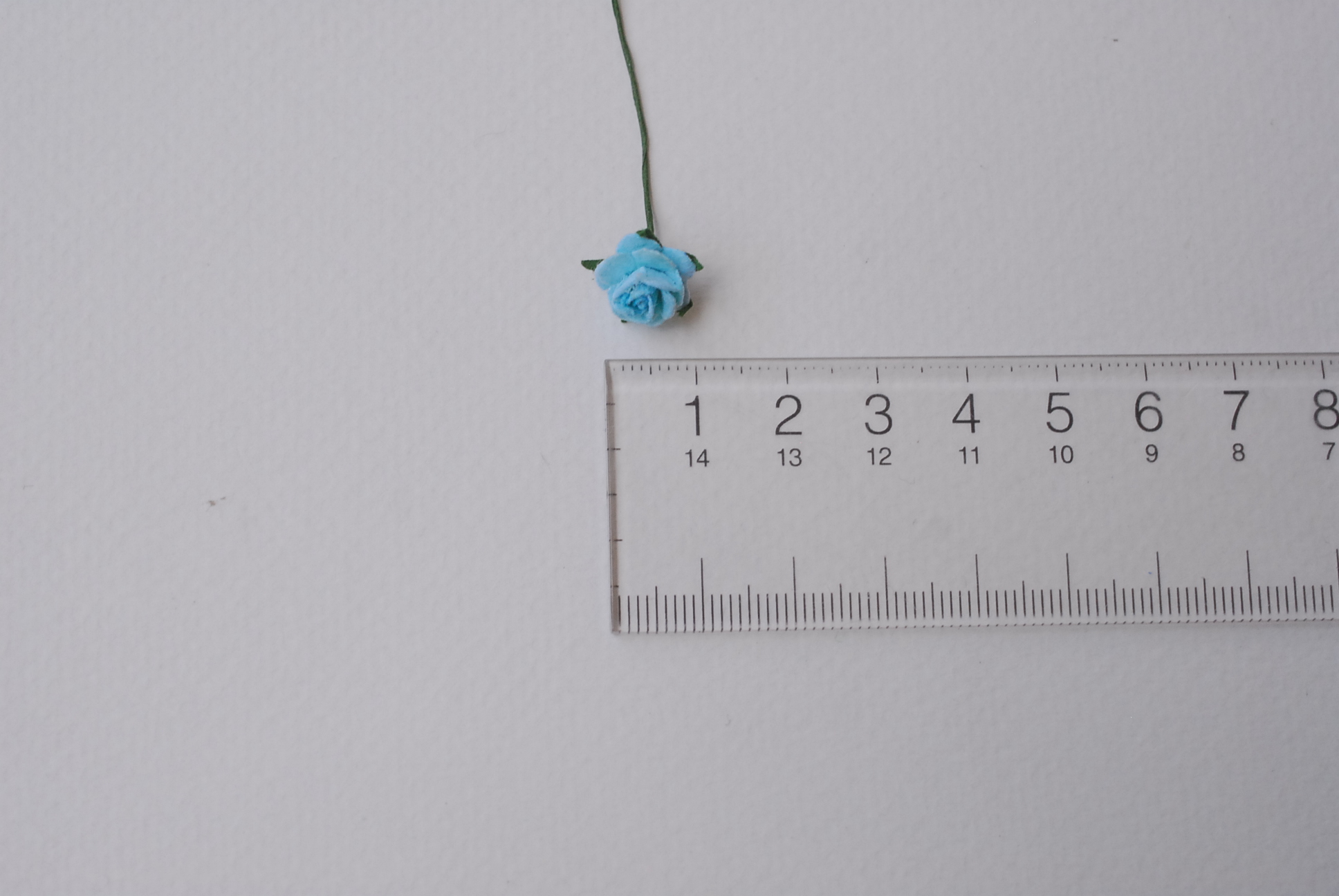 ดอกไม้กระดาษสาสำหรับตกแต่ง ของชำร่วย ดอกกุหลาบ กระดาษสา สีฟ้า ขนาด 1 cm. จำนวน 100 ดอก/1 ถุง