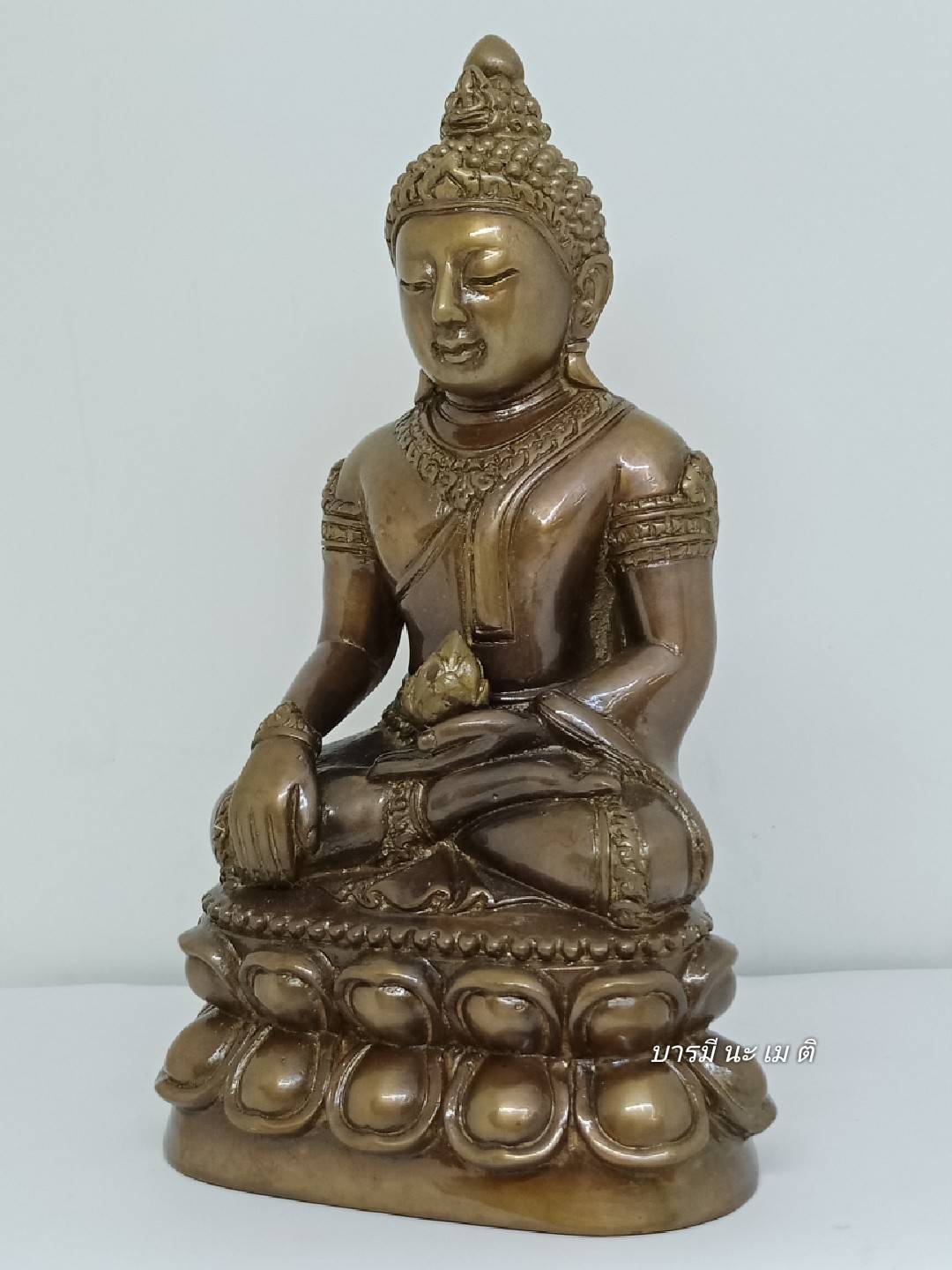 พระกริ่งอวโลพรหมคุณ เนื้อ : ชนวนโบราณ (กริ่งเสียงดังมาก)