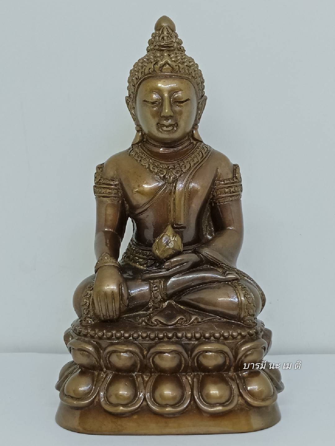 พระกริ่งอวโลพรหมคุณ เนื้อ : ชนวนโบราณ (กริ่งเสียงดังมาก)