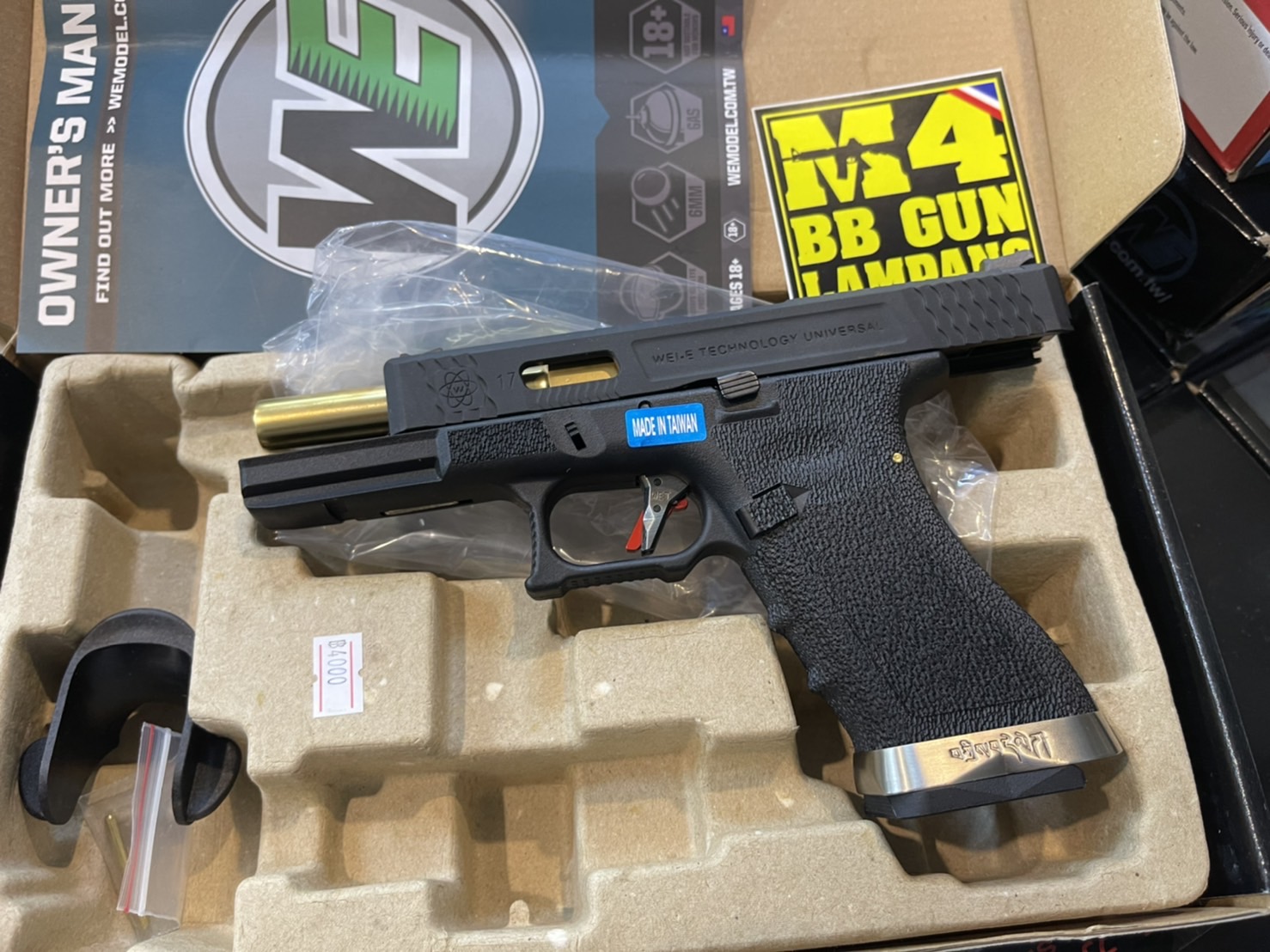 WE Glock17 Custom G-Force – เฟรมดำ สไลด์ดำ ลำกล้องทอง T5