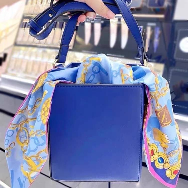 Estee Lauder Blue Crossbody Bag with Removable Pouch