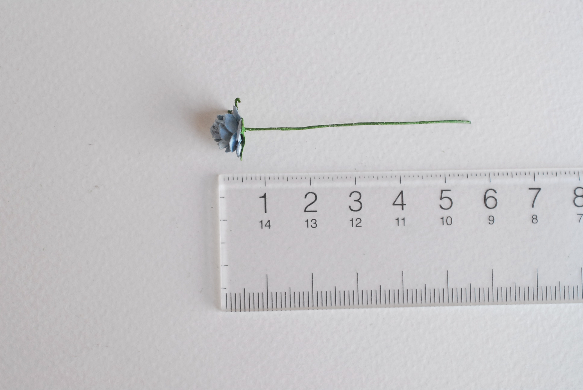 ดอกไม้กระดาษสาสำหรับตกแต่ง ของชำร่วย ดอกกุหลาบ กระดาษสา สีฟ้าตุ่น ขนาด 1 cm. จำนวน 100 ดอก/1 ถุง