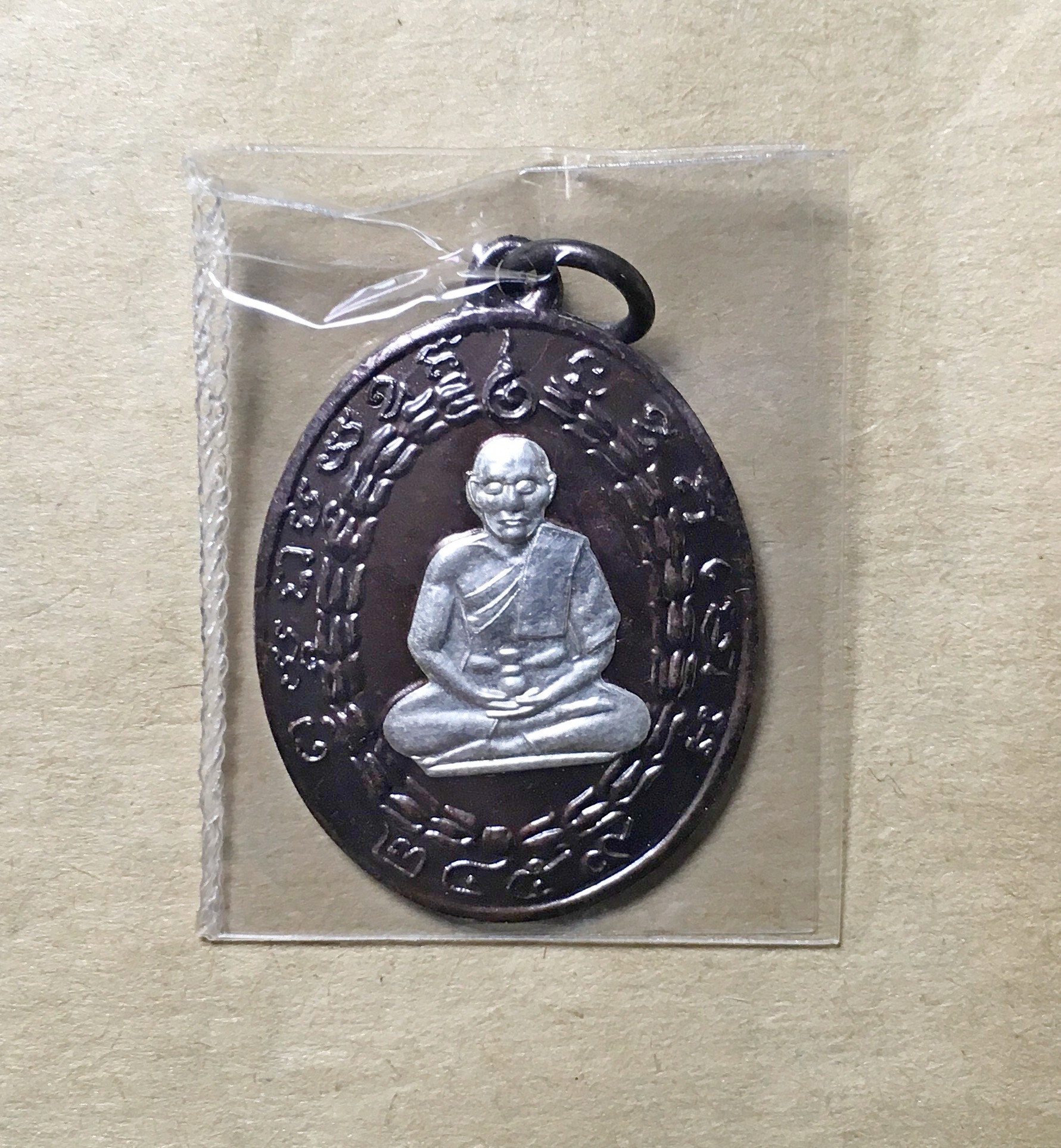 เหรียญหลวงพ่อแก้ว วัดพวงมาลัย จ.สมุทรสงคราม (รุ่นครบรอบ100 ปี 2459-2559) บล็อคสมเด็จวังบูรพา เนื้อทองแดงรมดำ หน้ากากเงิน