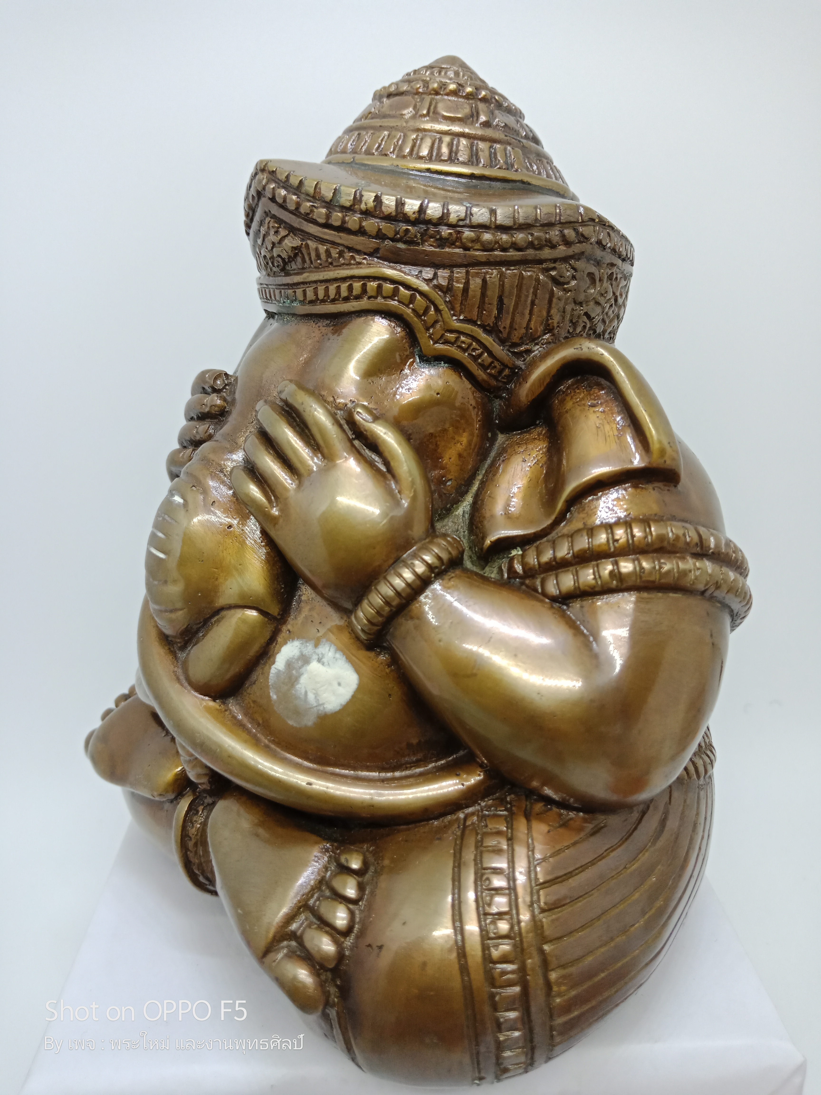 พระพิฆเนศปางอ้อมจักรวาล เนื้อ : รวมชนวน บรรจุกริ่งด้านใน