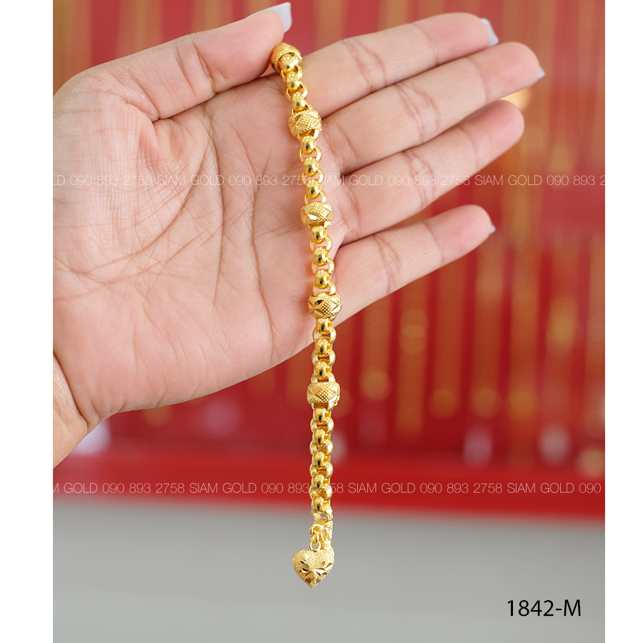 (M) สร้อยข้อมือผ่าหวายคั่นโอ่งห้อยจี้หัวใจ 3 บ.