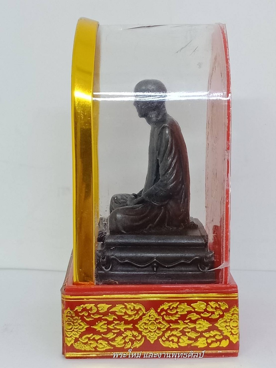 พระบูชา ตั้งหน้ารถ หลวงพ่อกวย เนื้อ : ทองเหลืองรมดำ