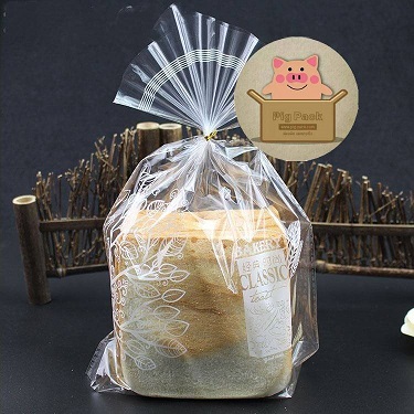ถุงใสใส่ขนมปังปอนด์(ลายใบไม้) บรรจุ100ชิ้น :006144 ขนาด 23x30+6cm.