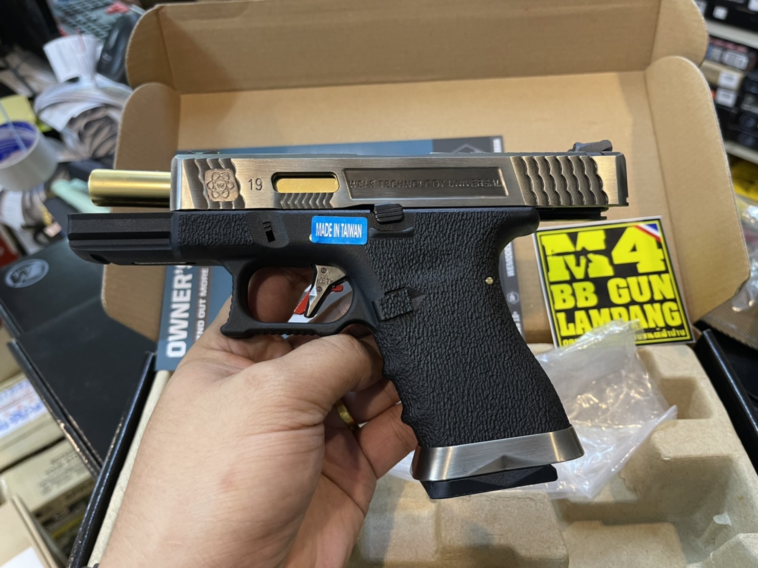 WE Glock19 G-Force Custom – เฟรมดำ สไลด์เงิน ลำกล้องทอง