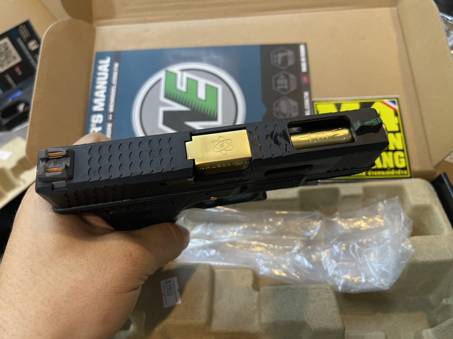 WE Glock19 G-Force Custom – เฟรมดำ สไลด์ดำ ลำกล้องทอง