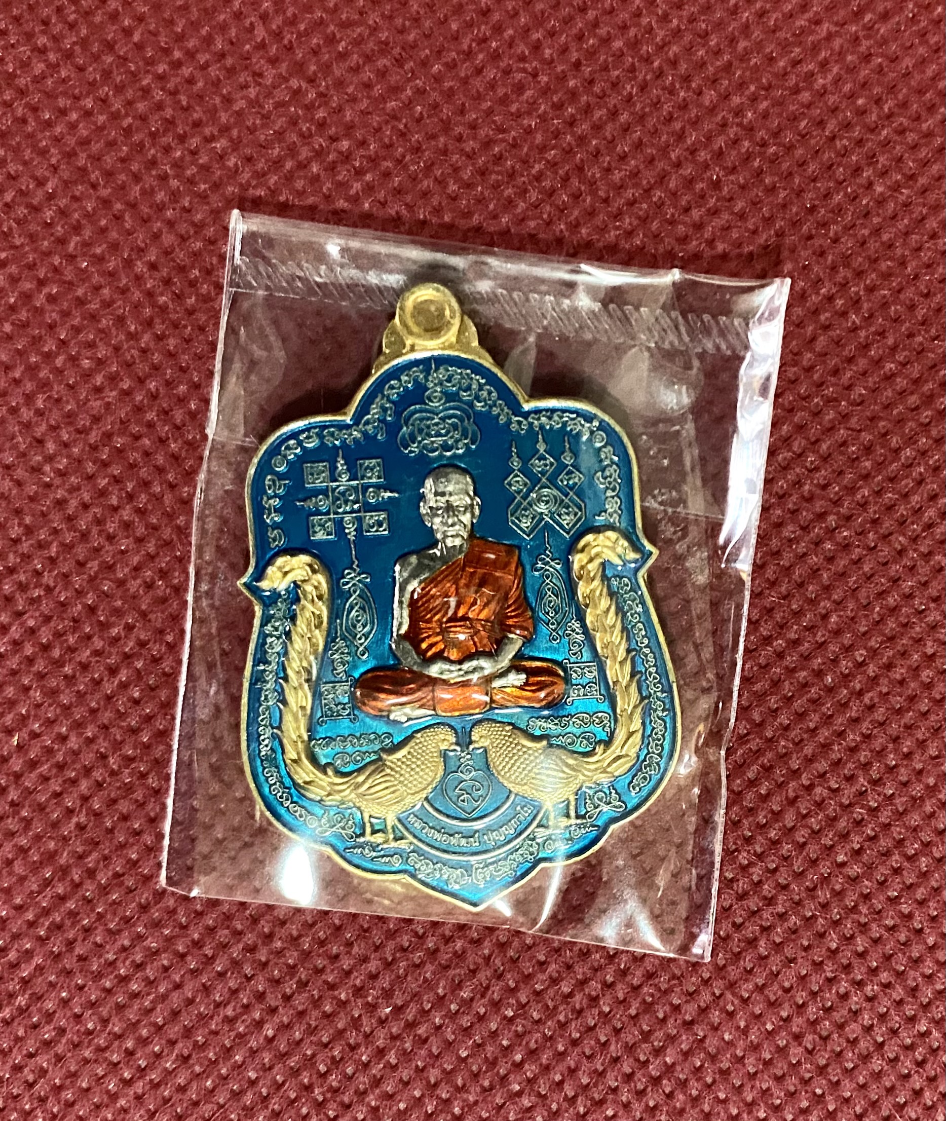 เหรียญรวย ๙ หน้า หลังสิงห์ เนื้ออัลปาก้าลงยาฟ้า ชุบนกยูงทอง ชุบสิงห์ทอง หลวงพ่อพัฒน์ วัดห้วยด้วน จ.นครสวรรค์ ปี64