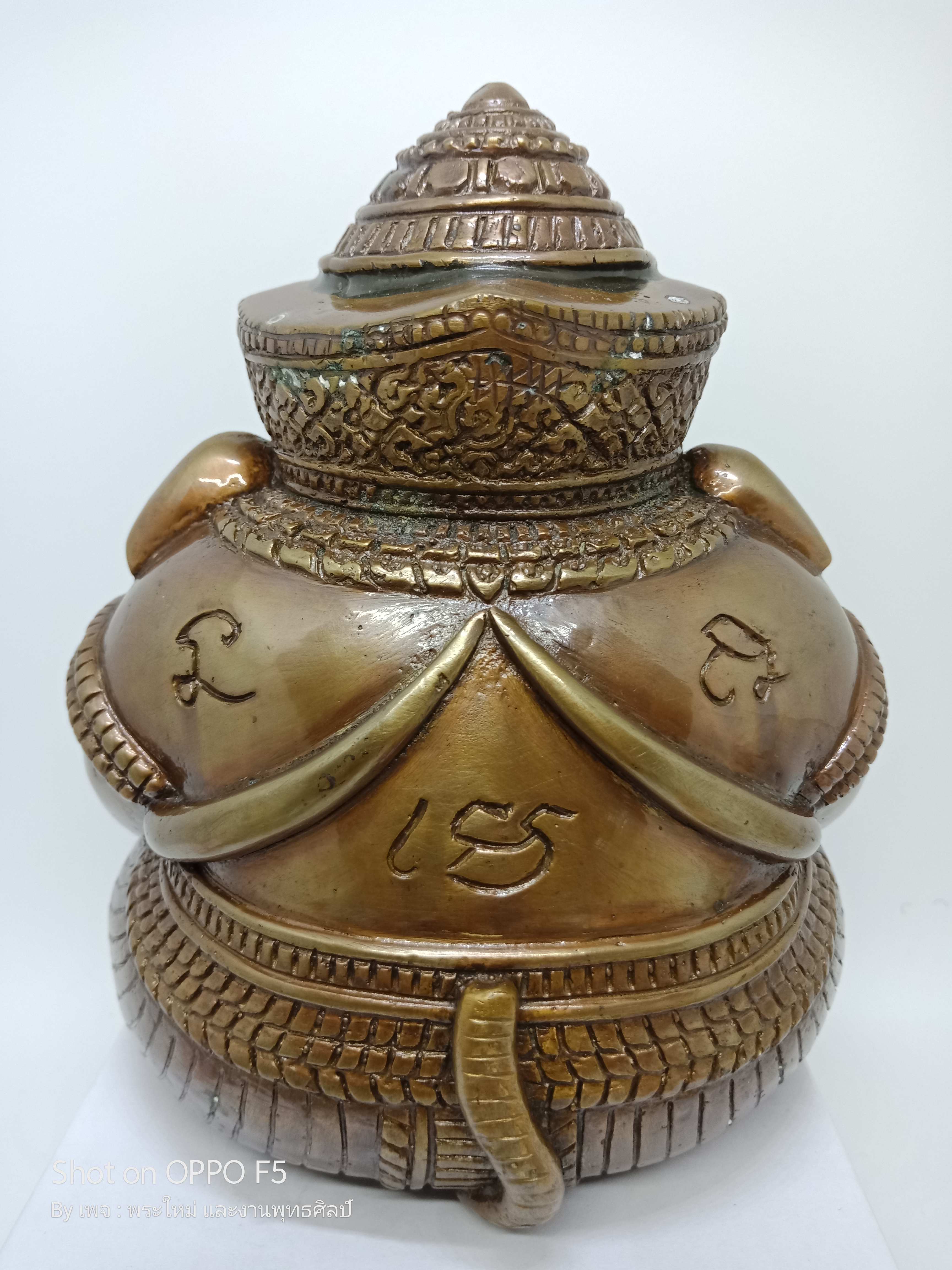 พระพิฆเนศปางอ้อมจักรวาล เนื้อ : รวมชนวน บรรจุกริ่งด้านใน