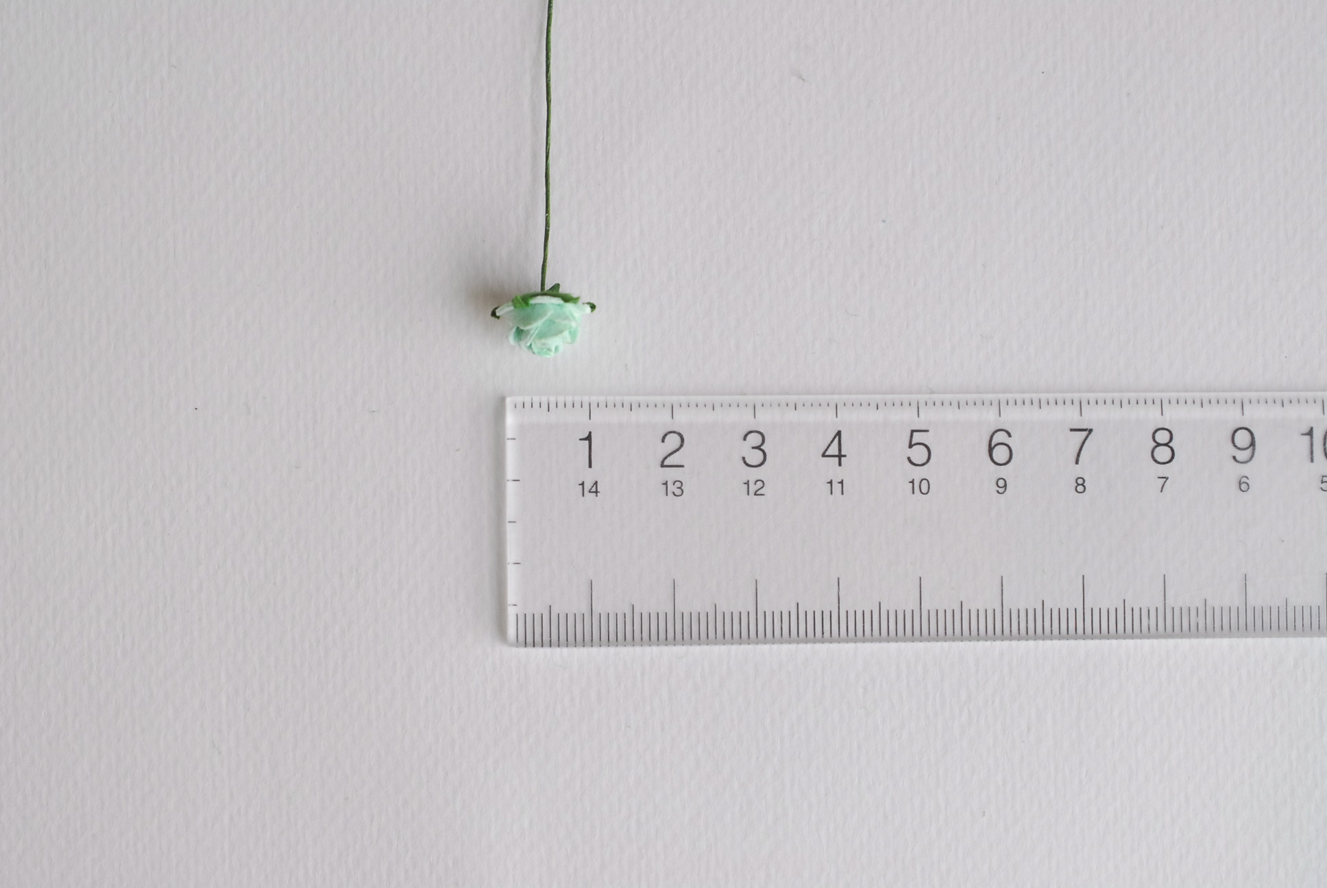 ดอกไม้กระดาษสาสำหรับตกแต่ง ของชำร่วย ดอกกุหลาบ กระดาษสา สีมิ้น #166 ขนาด 1 cm. จำนวน 100 ดอก/1 ถุง