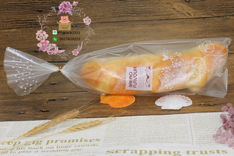 ถุงขนมปังขุ่นลายใบบัวขนาด 12x38 cm. แพ็ค100ชิ้น : 006931