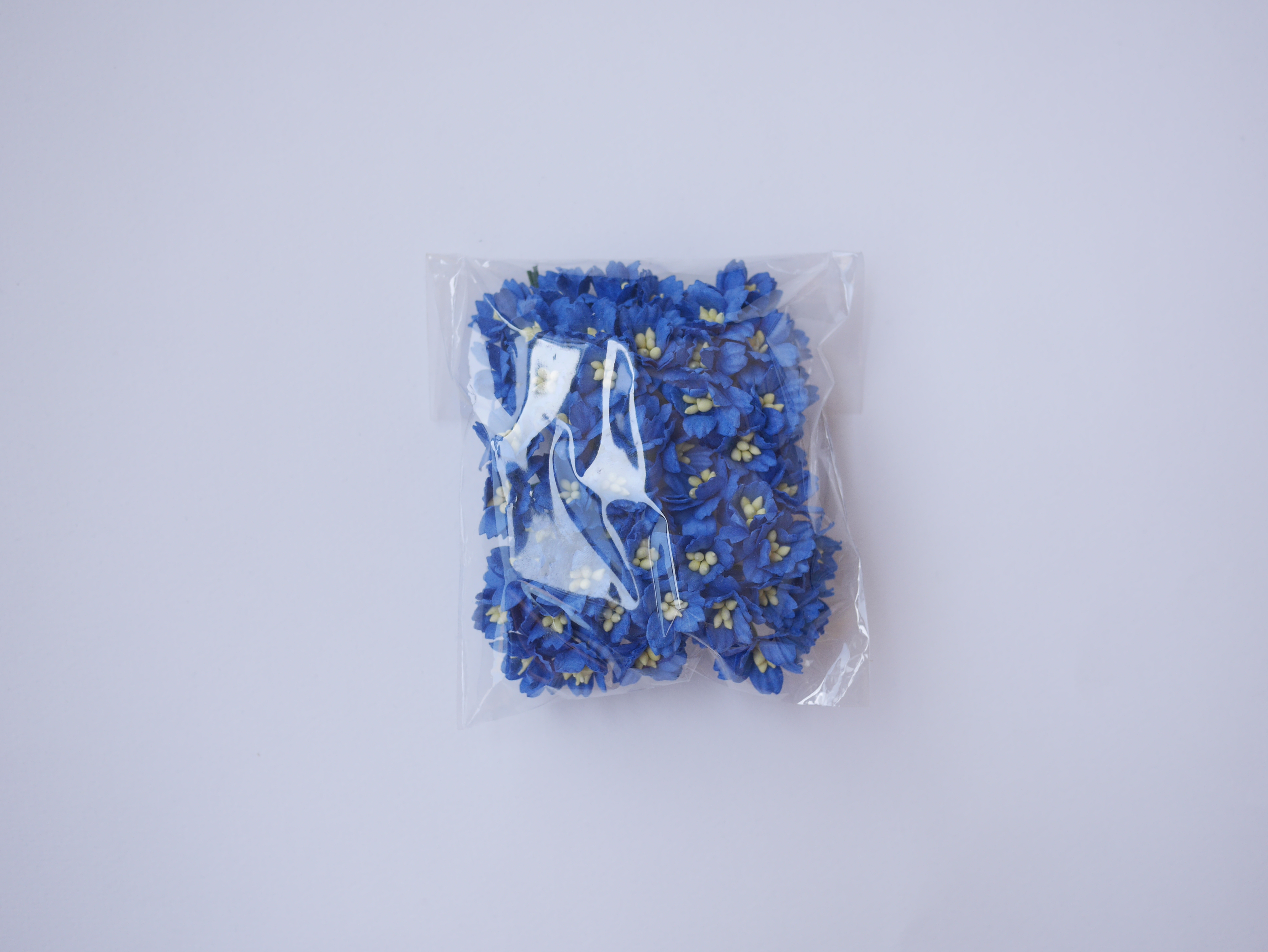 ดอกไม้กระดาษสา ดอกซากุระกระดาษ ขนาดเล็ก ดอกไม้กระดาษสาราคาส่ง ดอกไม้กระดาษสำหรับตกแต่งของชำร่วย งานแต่งงาน ทำช่อดอกไม้ติดอกเจ้าบ่าว ข้อมือดอกไม้เจ้าสาว ขนาด2.0 cm. 50 ดอก สีน้ำเงินน้ำทะเล Paper flowers supplies: DIY wedding tools small Cherry blossom