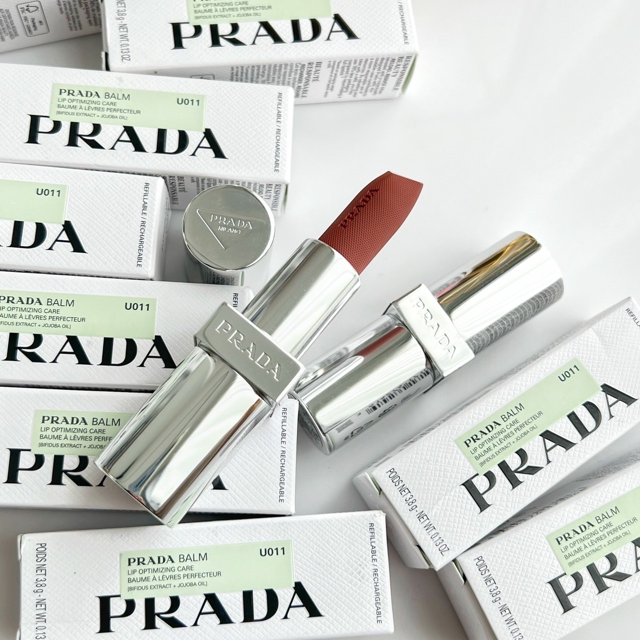 ลิปสติก Prada Beauty Moisturizing Lip Balm 3.8g # U011 Noisette (Full Size)