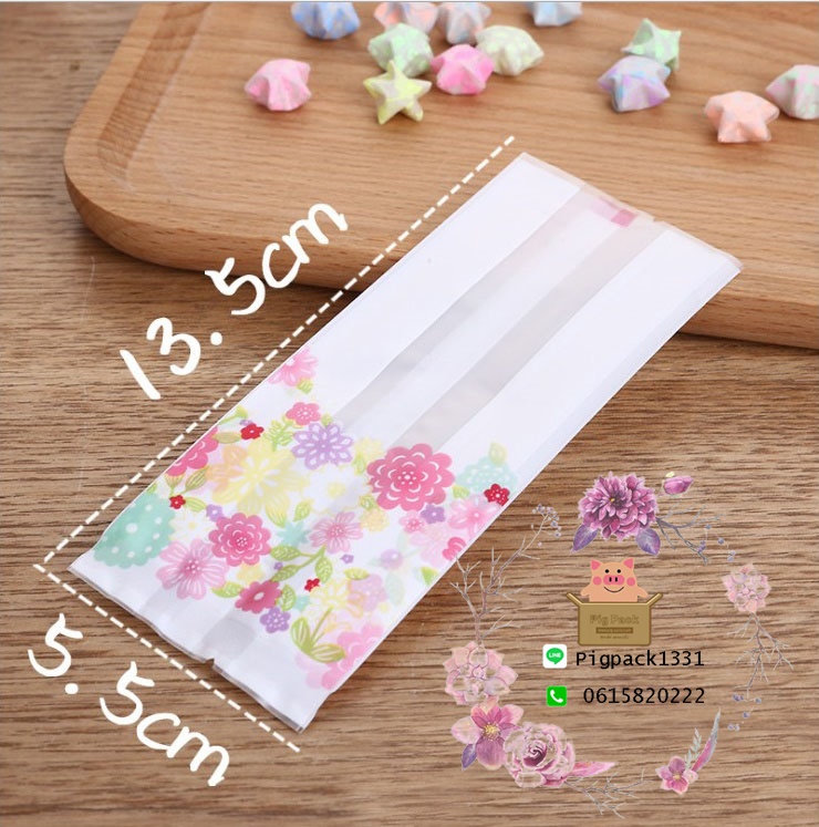 ถุงซองพลาสติกขุ่นขยายข้างสีขาวลายดอกไม้ 5.5x13.5+3 cm. 100 ชิ้น : 006929