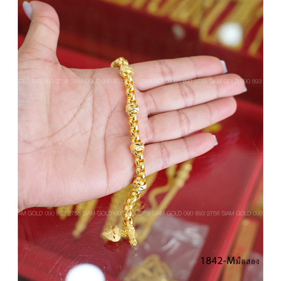 (M-มือสอง) สร้อยข้อมือ ผ่าหวายคั่นโอ่งห้อยจี้หัวใจ 3 บาท