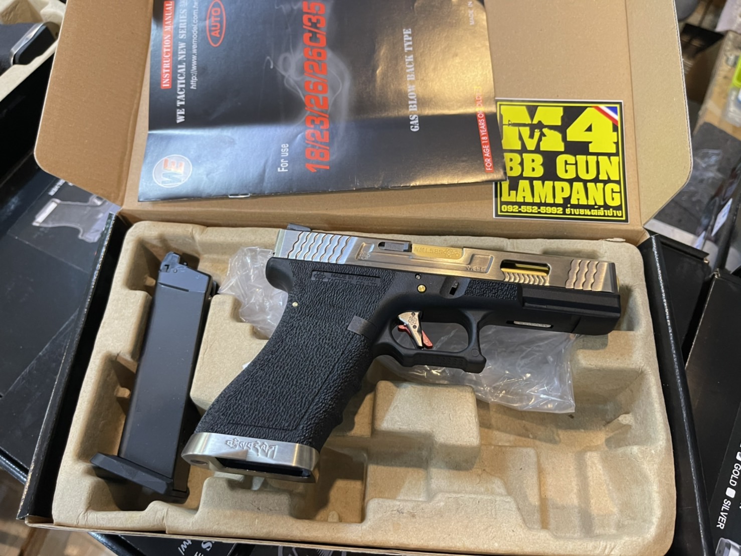 WE Glock18 G-Force Custom – เฟรมดำ สไลด์เงิน ลำกล้องทอง T5