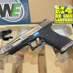 WE - Glock 34 G-Force T1 เฟรมดำ สไลด์เงิน ท่อทอง