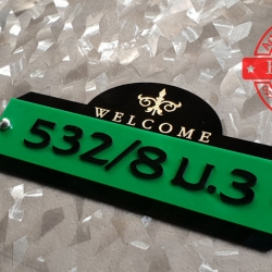 ป้ายบ้านเลขที่ อะคริลิคสีดำแถบเขียว แกะสลักเวลคั่ม